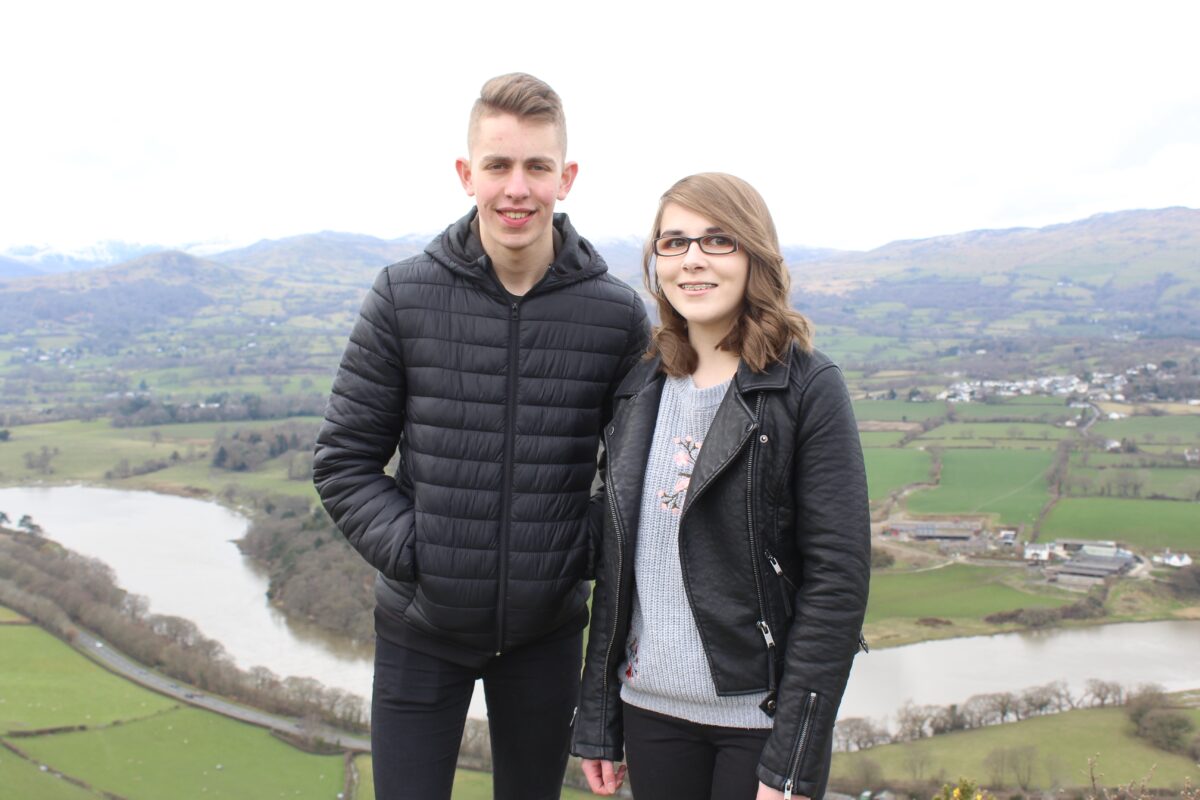 A photo of my brother, Meilyr, and I in front of the Snowdonia mountains