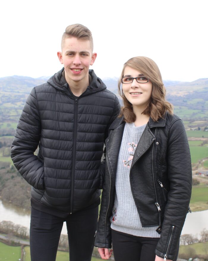 A photo of my brother, Meilyr, and I in front of the Snowdonia mountains