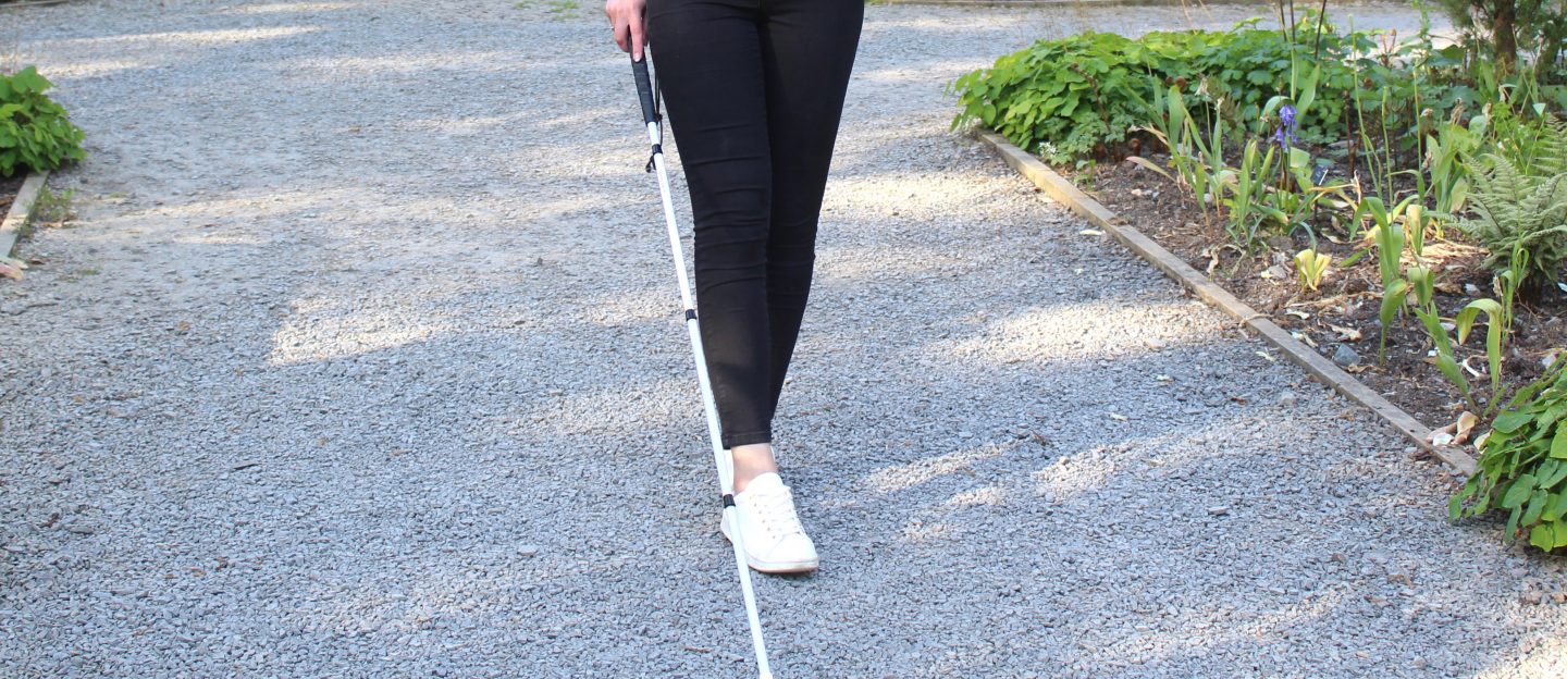 8 ways you can help a blind/VI person: A photo of Elin using her cane