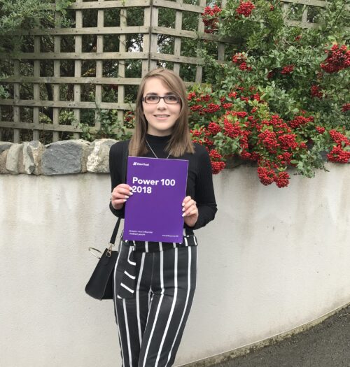 A photo of Elin holding the Shaw Trust disability power list 2018.