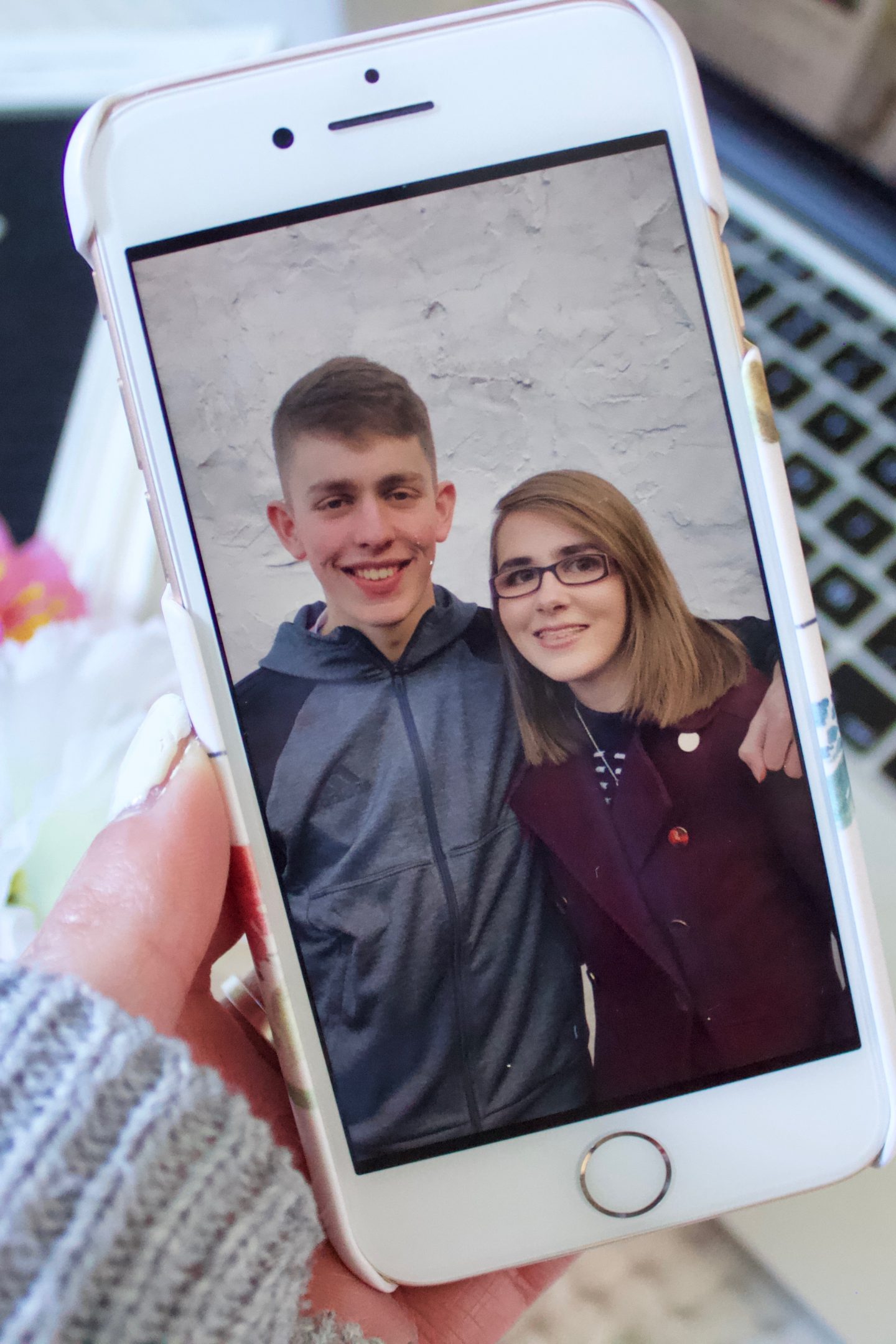 A photo of me and my brother on my phone