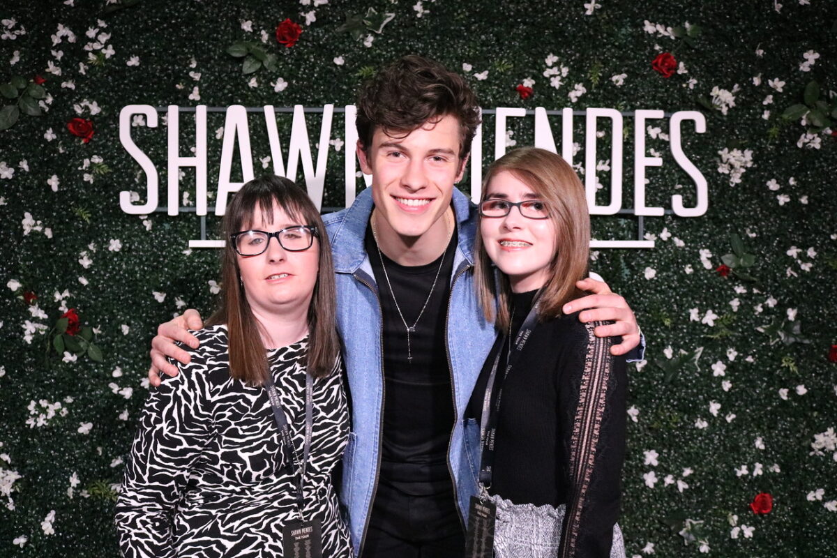 A photo of Shawn Mendes, Elin and Holly, Shawn is in the middle with his arms around both of us