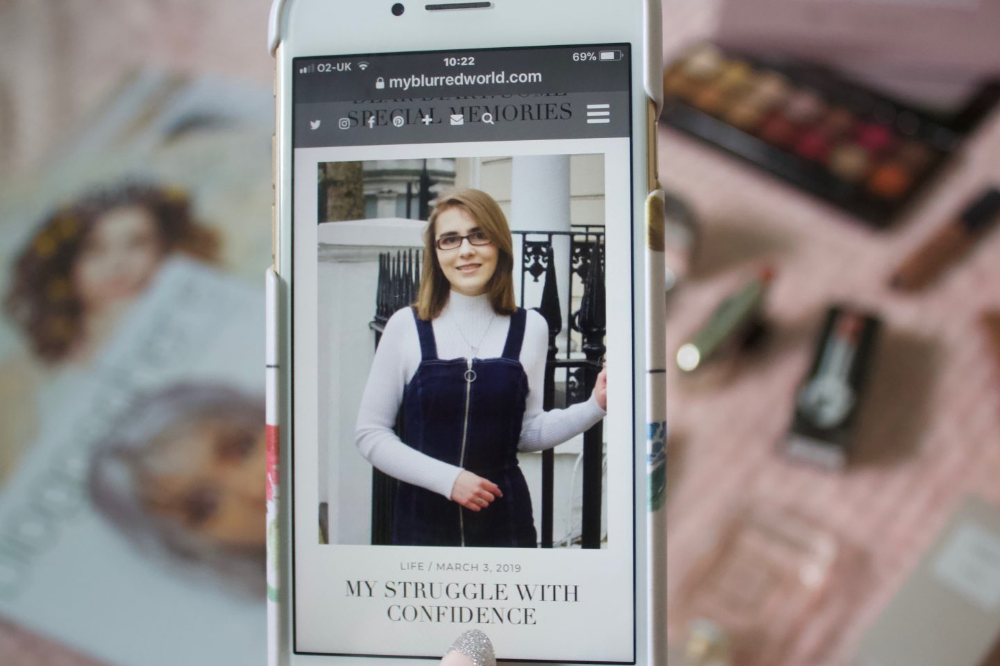 A photo of my blog post 'my struggle with confidence' showing on my phone